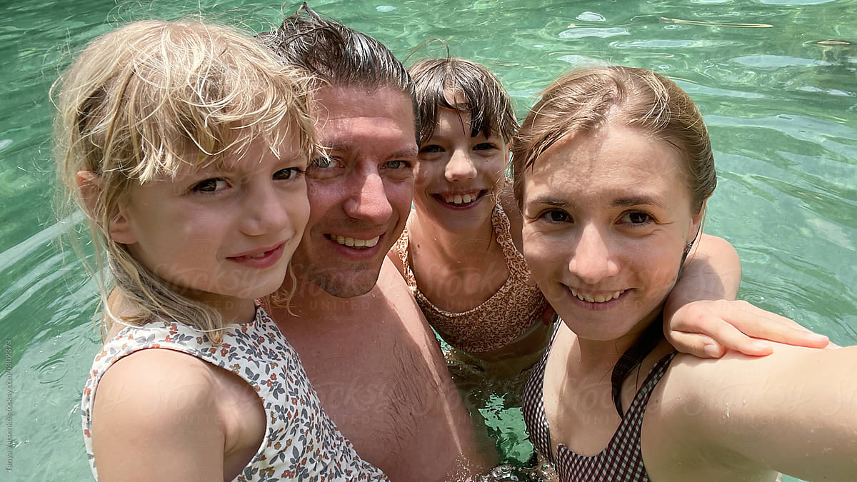 Family selfie photo in the water