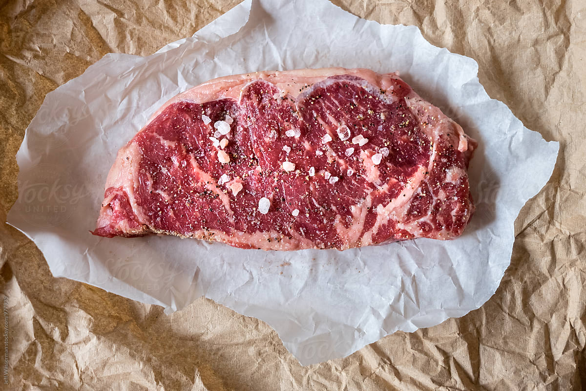 Raw Seasoned Strip Loin Steak