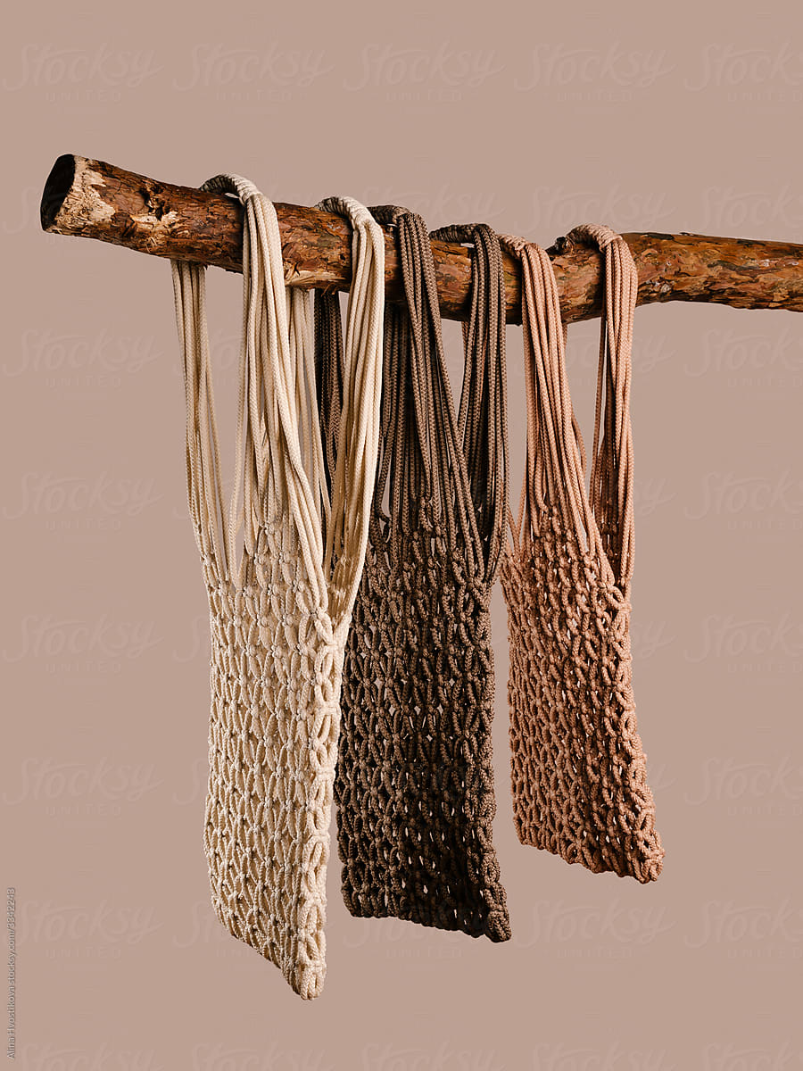 Eco bags hanging on stick