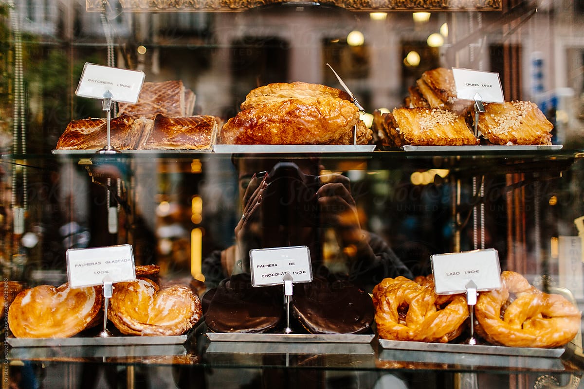  Someone Taking A Photo Inside Of A Bakery By Stocksy Contributor 