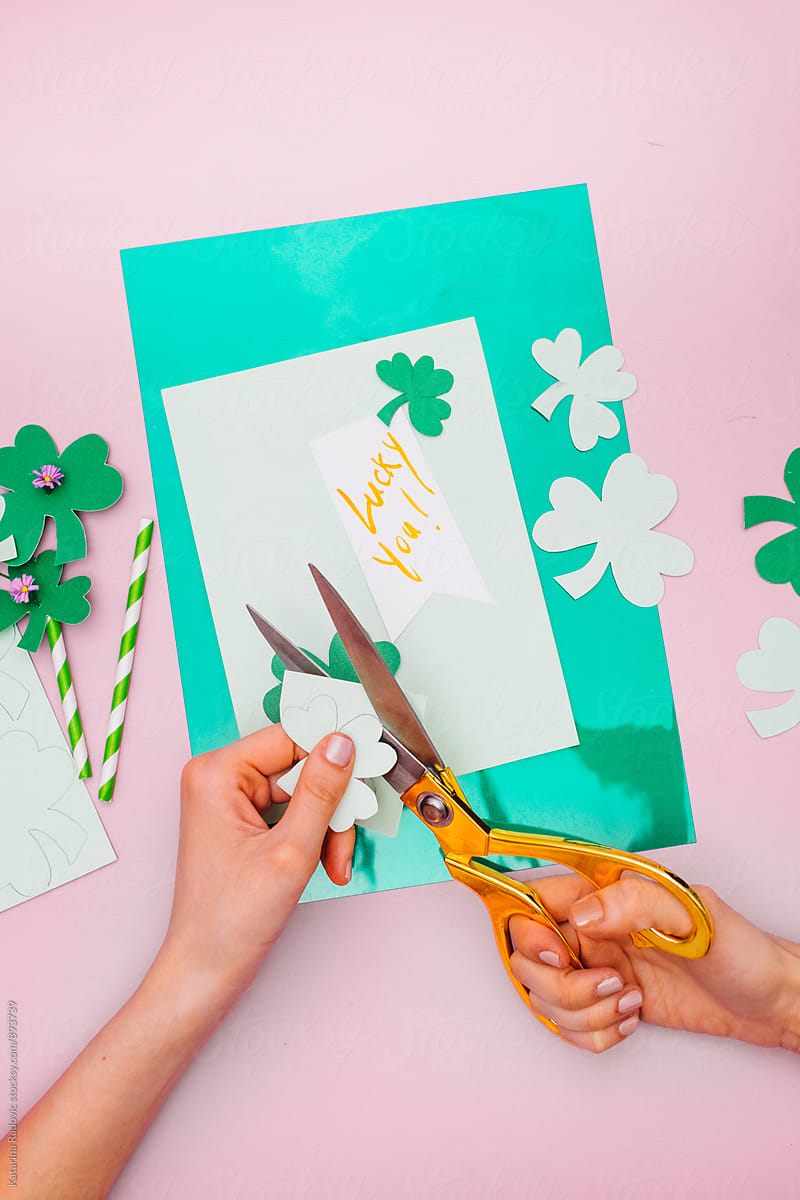 Woman Making Paper Shamrock as a Decoration for Saint Patrick\'s Day