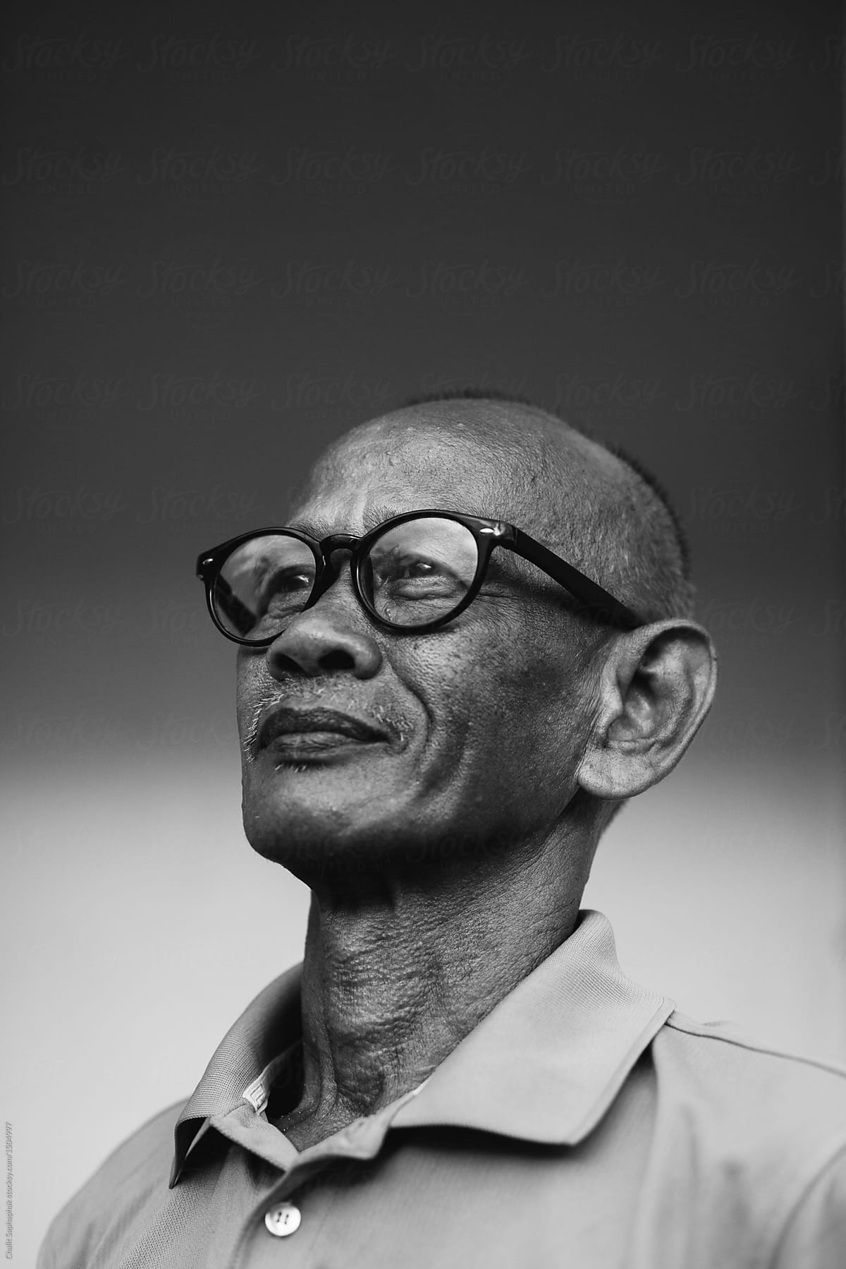 Portrait of Asian man wearing glasses