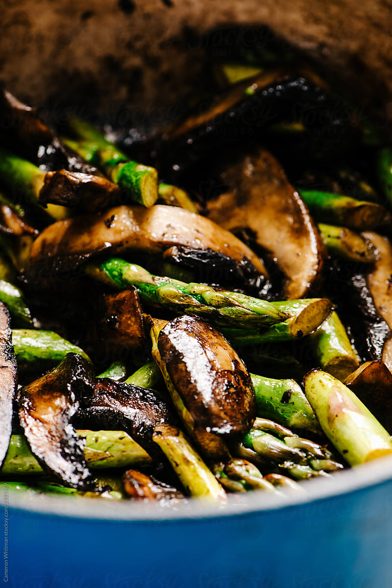 Detail of cooked asparagus and Portobello mushrooms