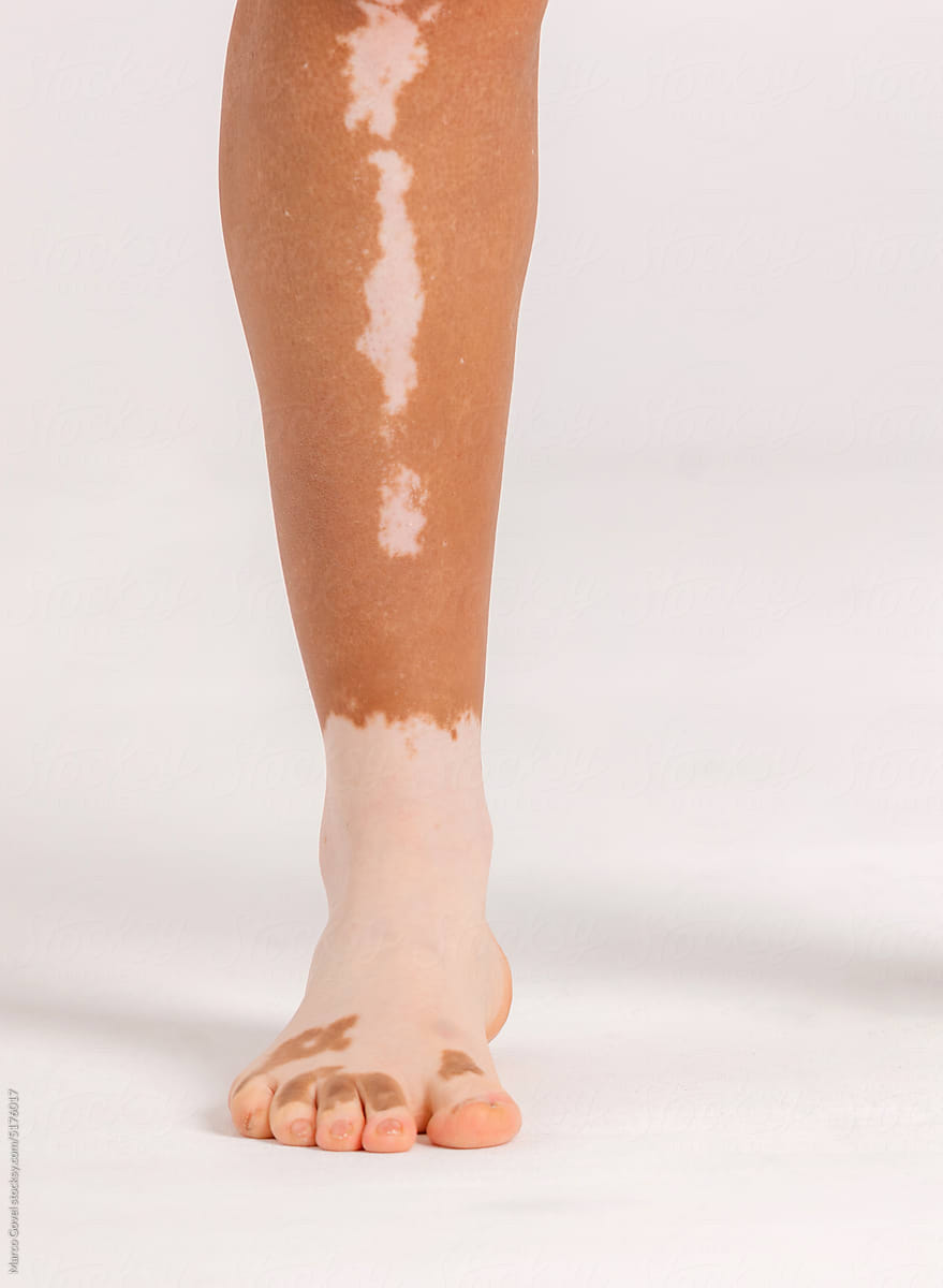 Crop naked black woman legs