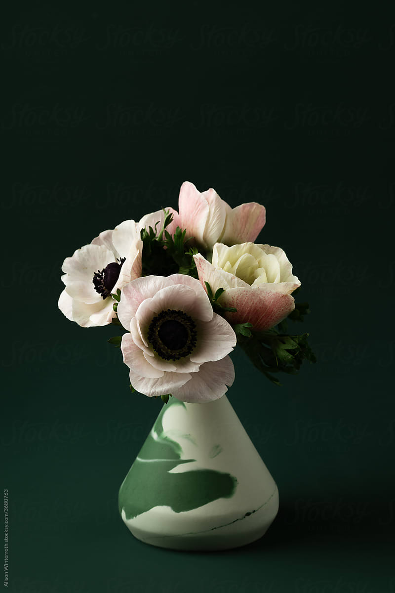 White Anemones In Green Vase