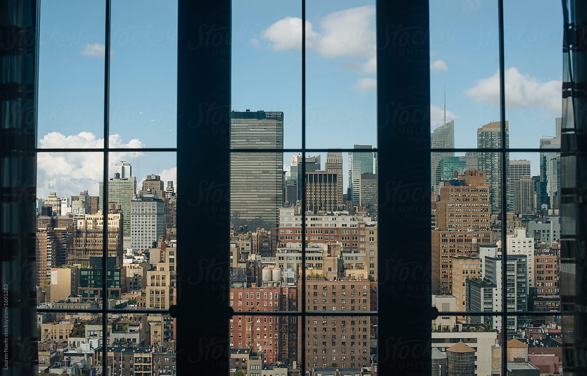 View Of City Inside Of Apartment Window By Stocksy Contributor
