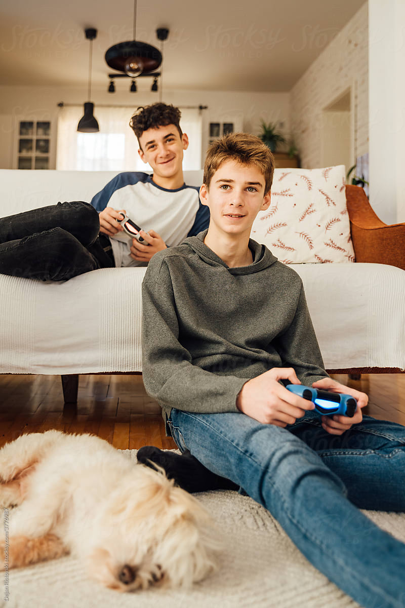 Teenagers playing video games