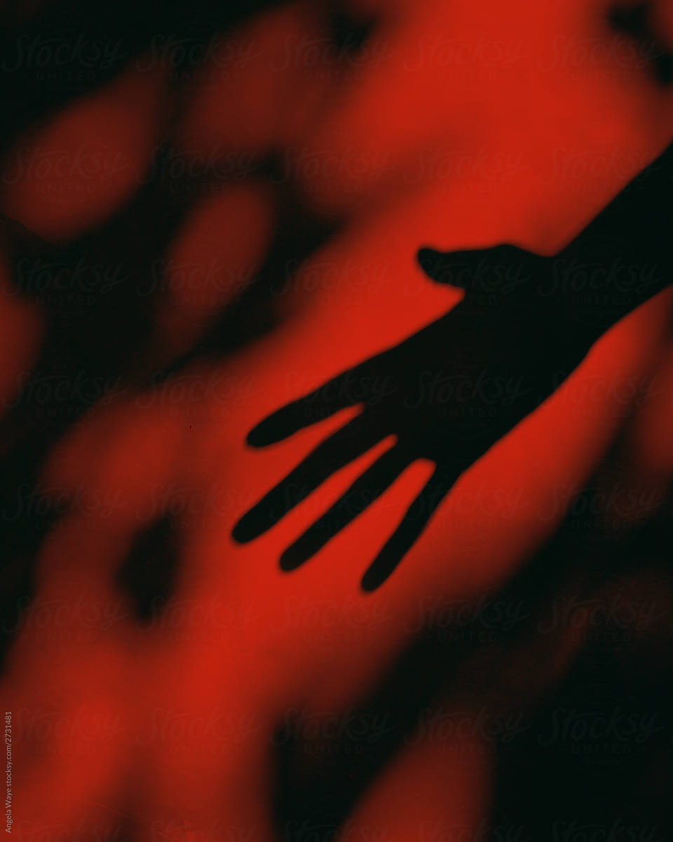 Scary Hand Shadow Reaching on Red