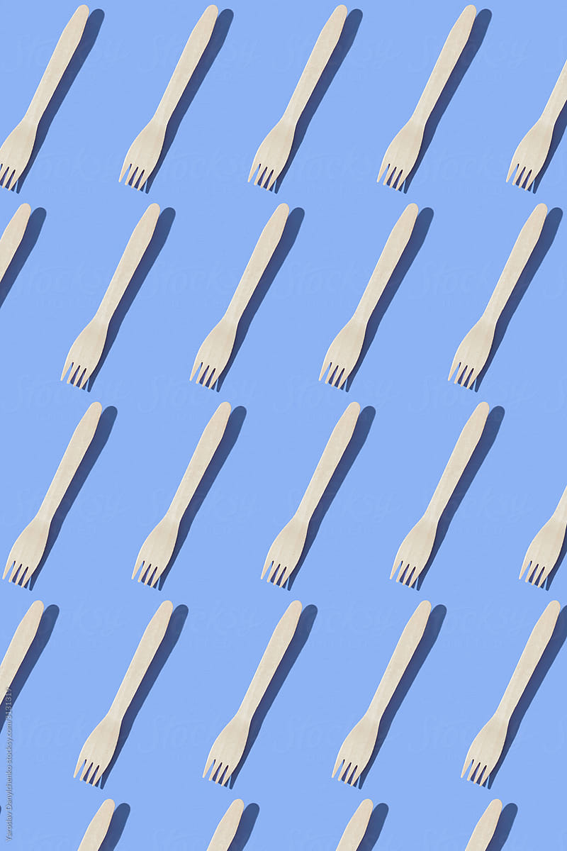 Wooden disposable forks pattern.