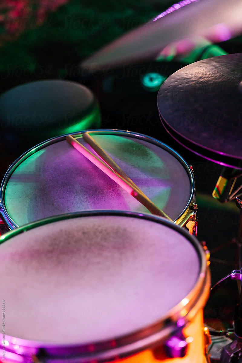 Set of drums on stage in neon illumination