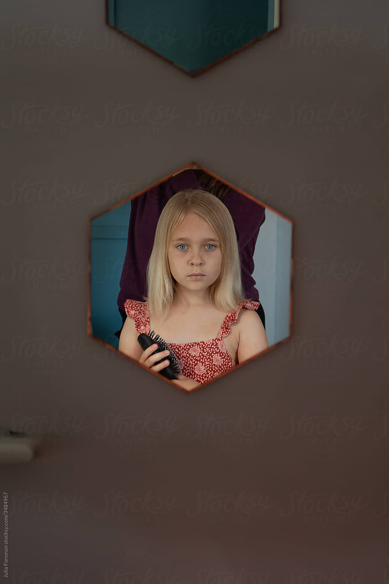 Portrait of a girl in a mirror.