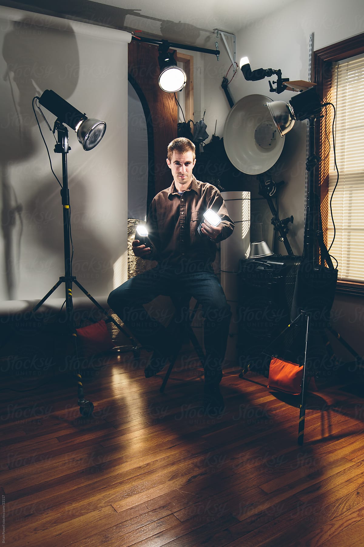 photographer  in studio with gear