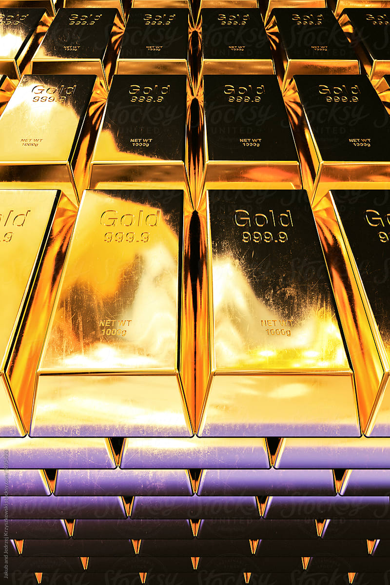 Gold Bars Laying On Top of Each Other
