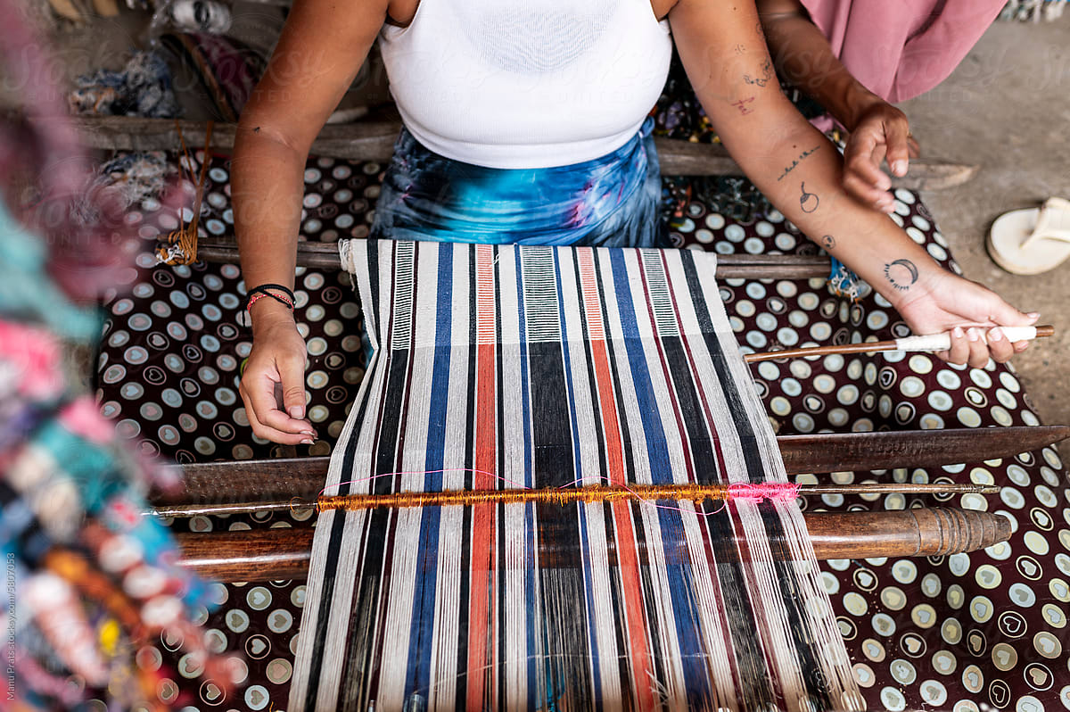 Traveler woman making traditional clothing