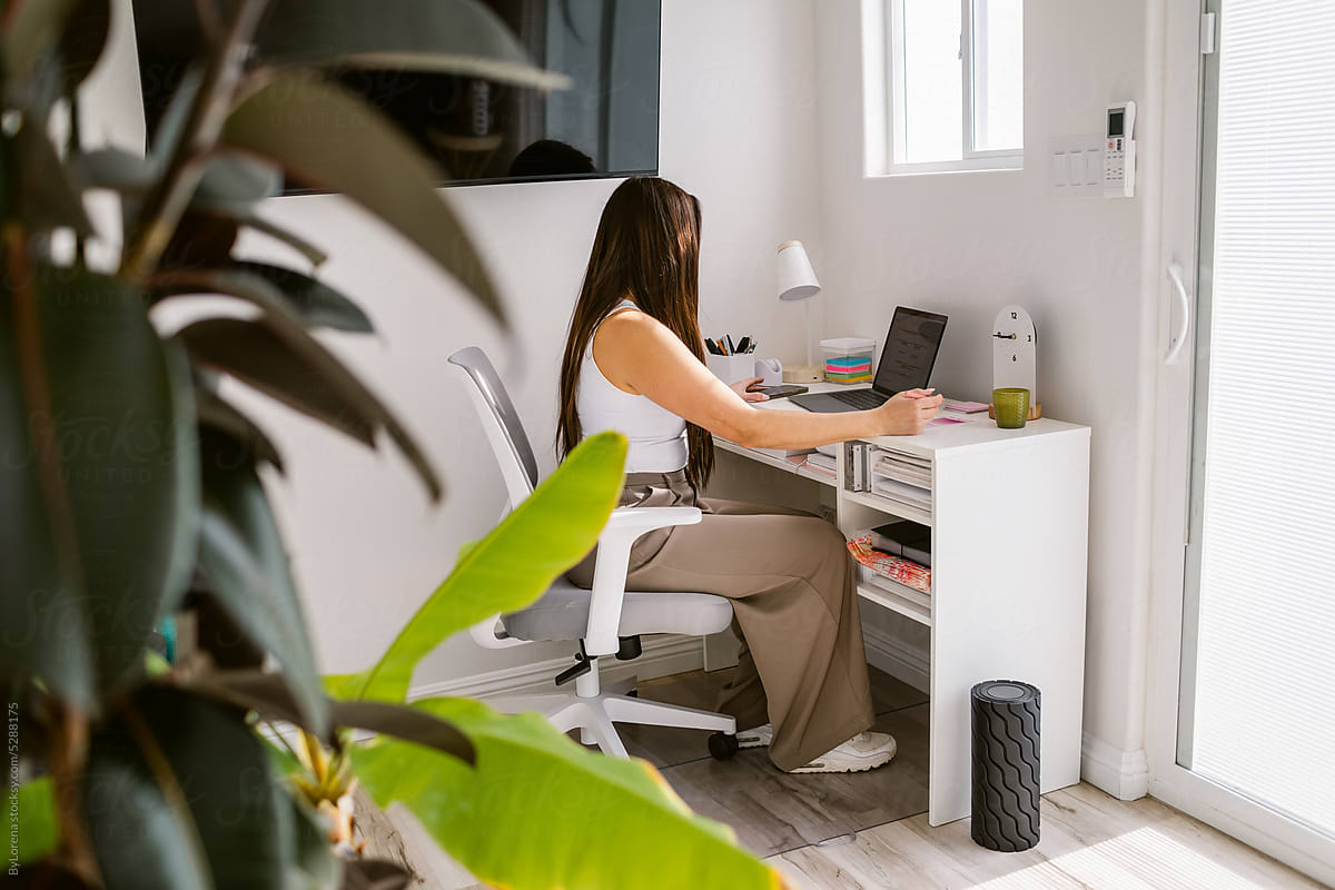 Latin Wellness woman at Work in home office