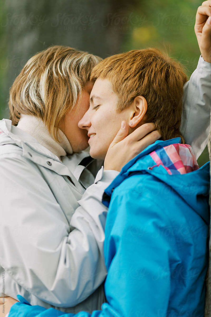 two woman kissing
