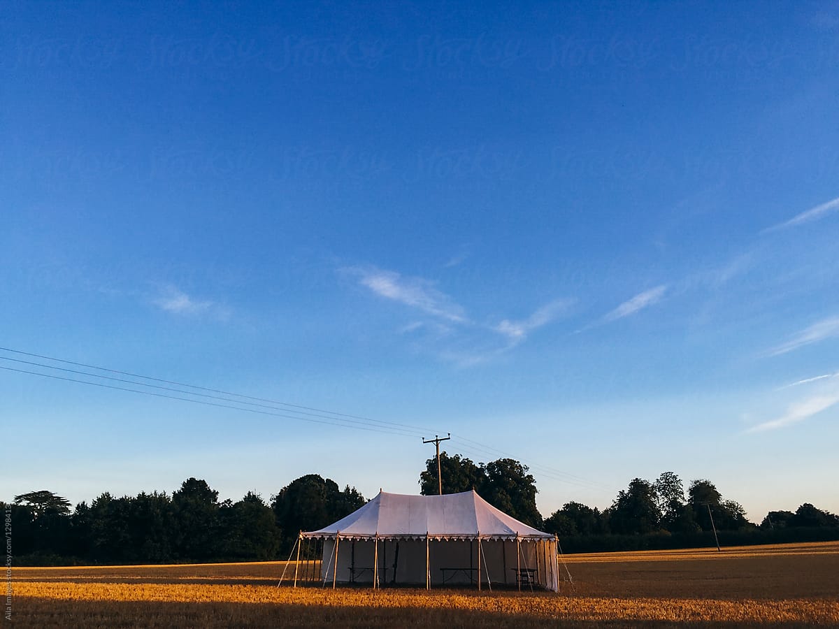 Vintage marquee tent in a wheat field