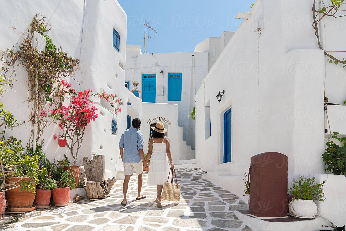 Anonymous Couple Having A Walk In Greece, Paros Village