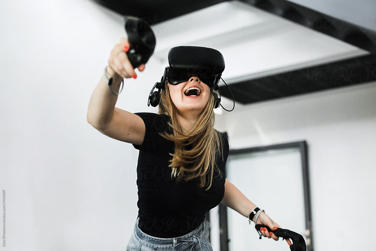 Blond girl playing VR game by Irina Efremova - Gaming, Virtual ...