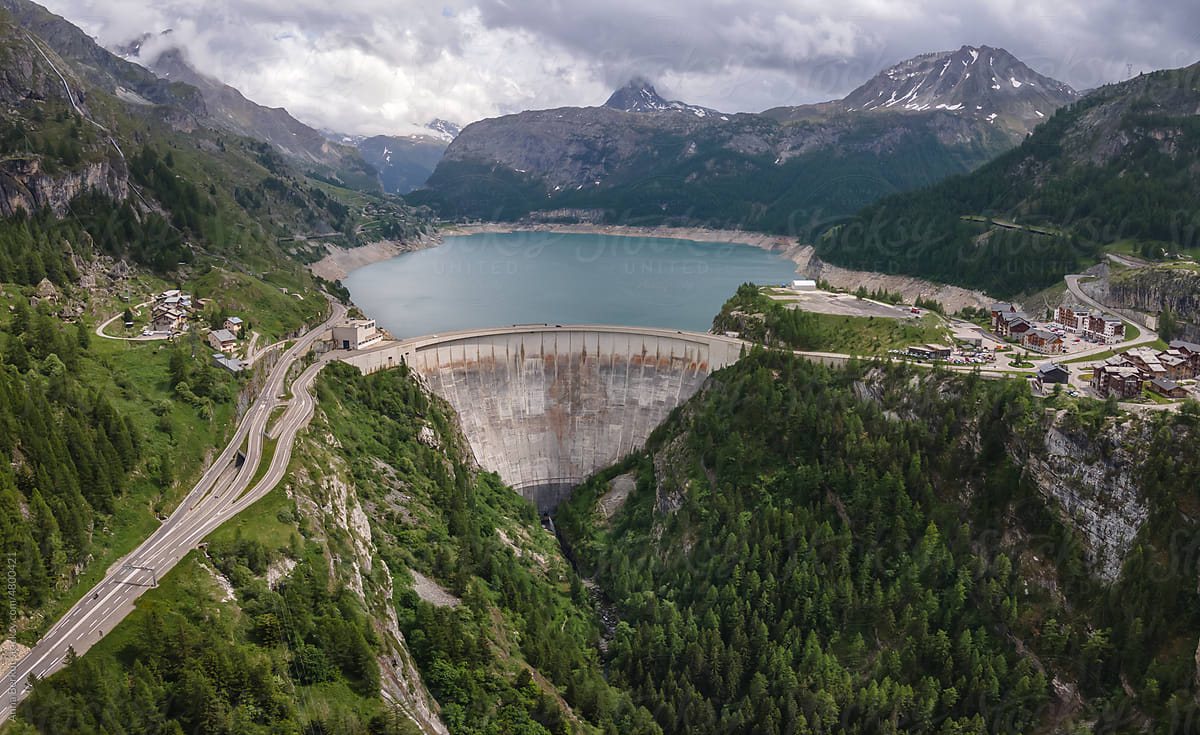 panoramic view of water dam in Alps, France, renewable energy