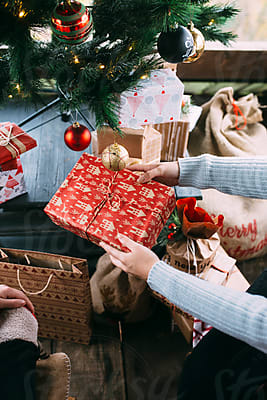 Elderly Woman Opening Christmas Gifts by Stocksy Contributor Jovana  Rikalo - Stocksy
