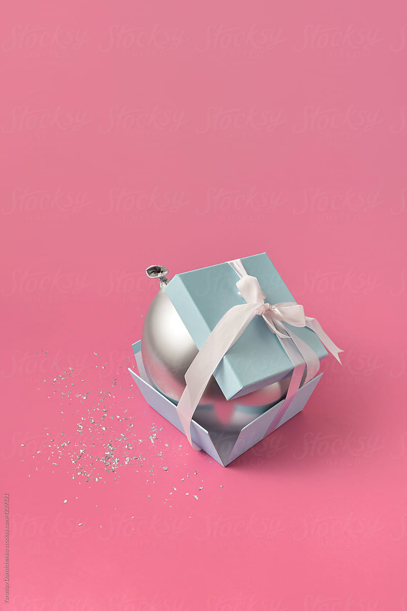 Festive gift box with silver balloon
