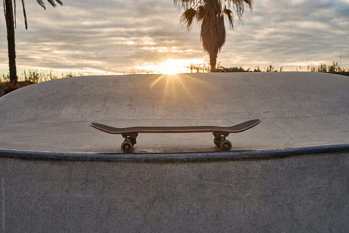 Skateboard on concrete ramp