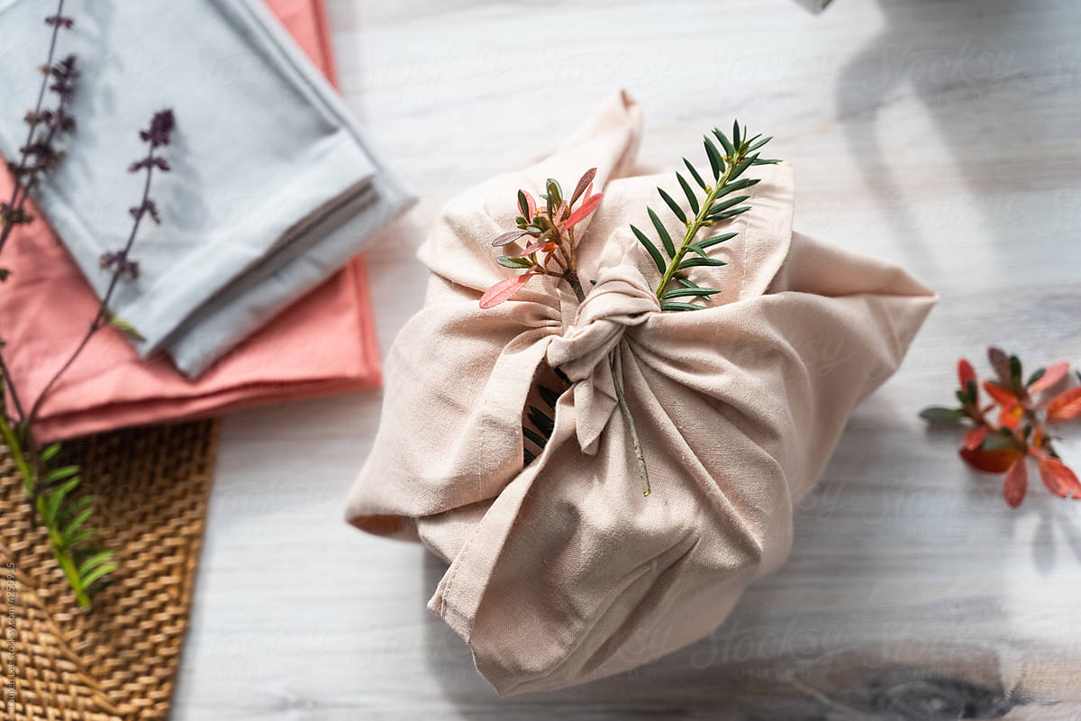 Thoughtful gift wrapped in fabric