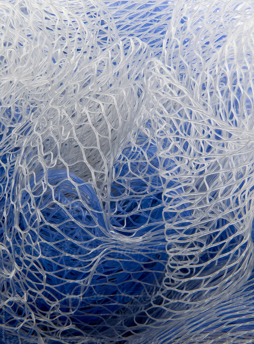 macro of blue mesh fabric