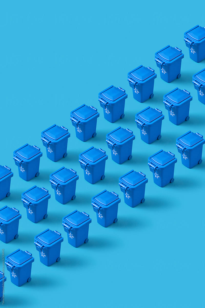 Rows of small blue trash cans