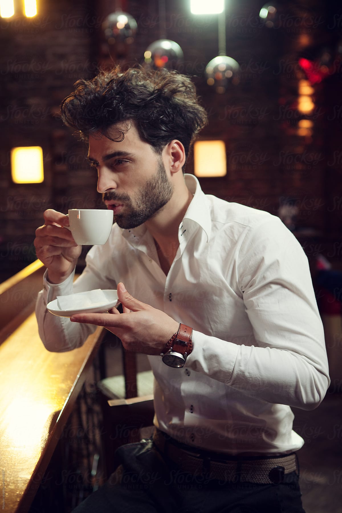 Handsome Young Man Drinking Coffee By Stocksy Contributor Mosuno