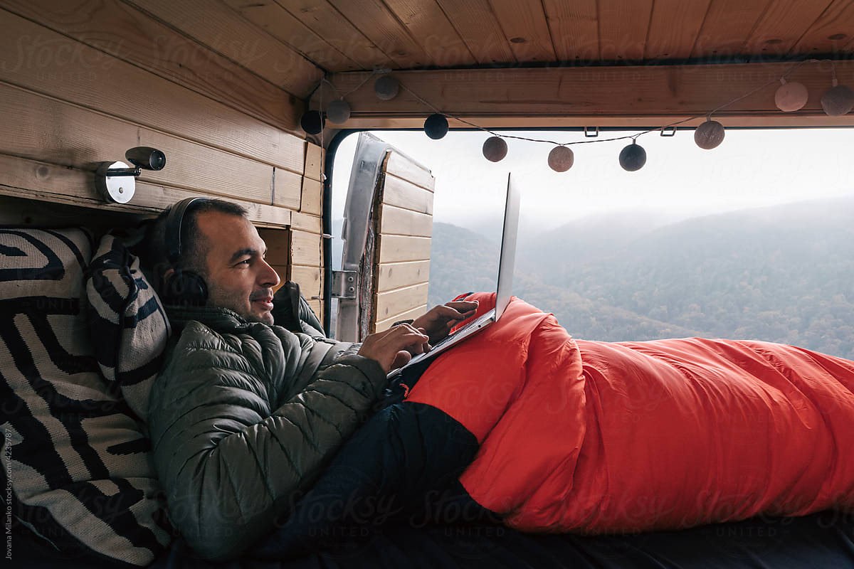 Man enjoying fresh air in his camper home