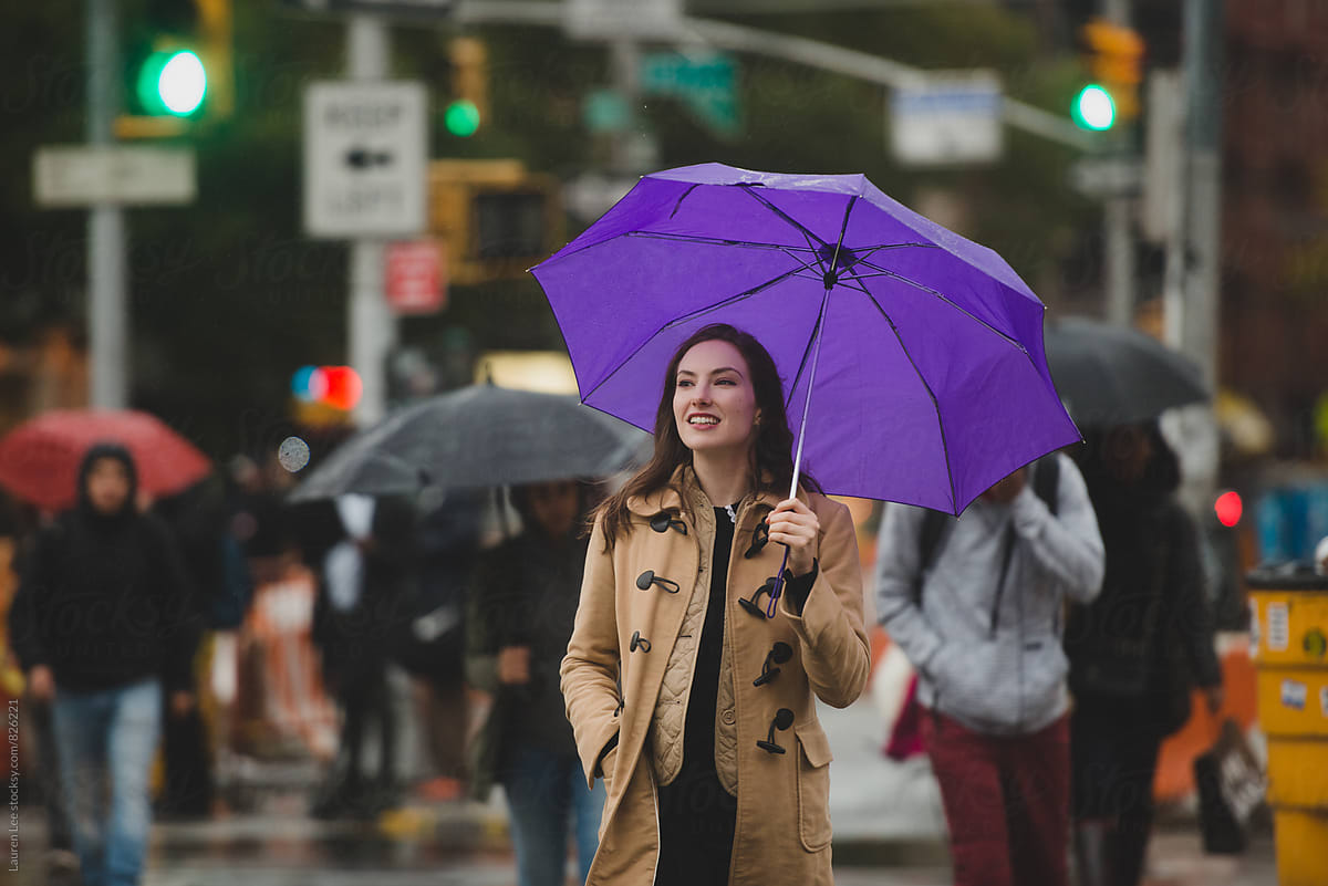 Woman walking in the rain