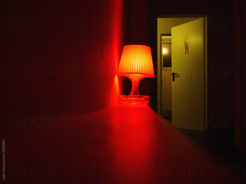 Red lighting lamp on shelf