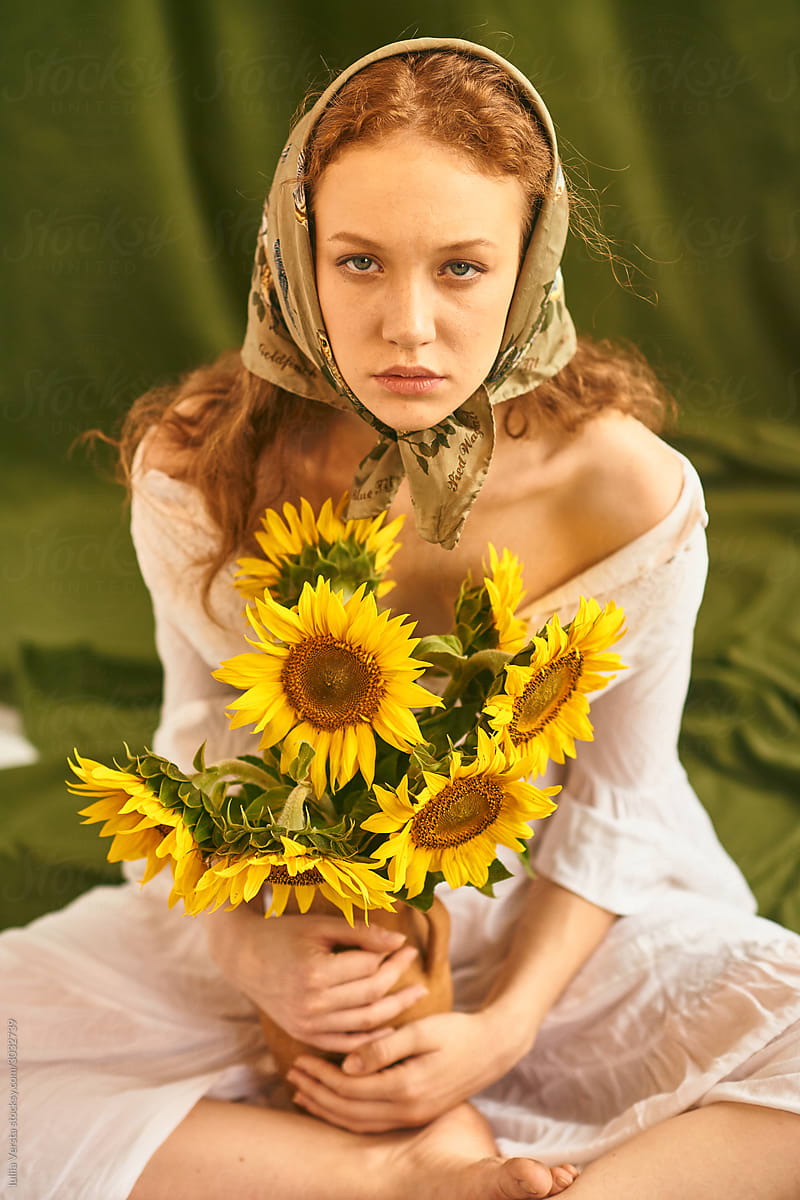 A girl with sunflowers