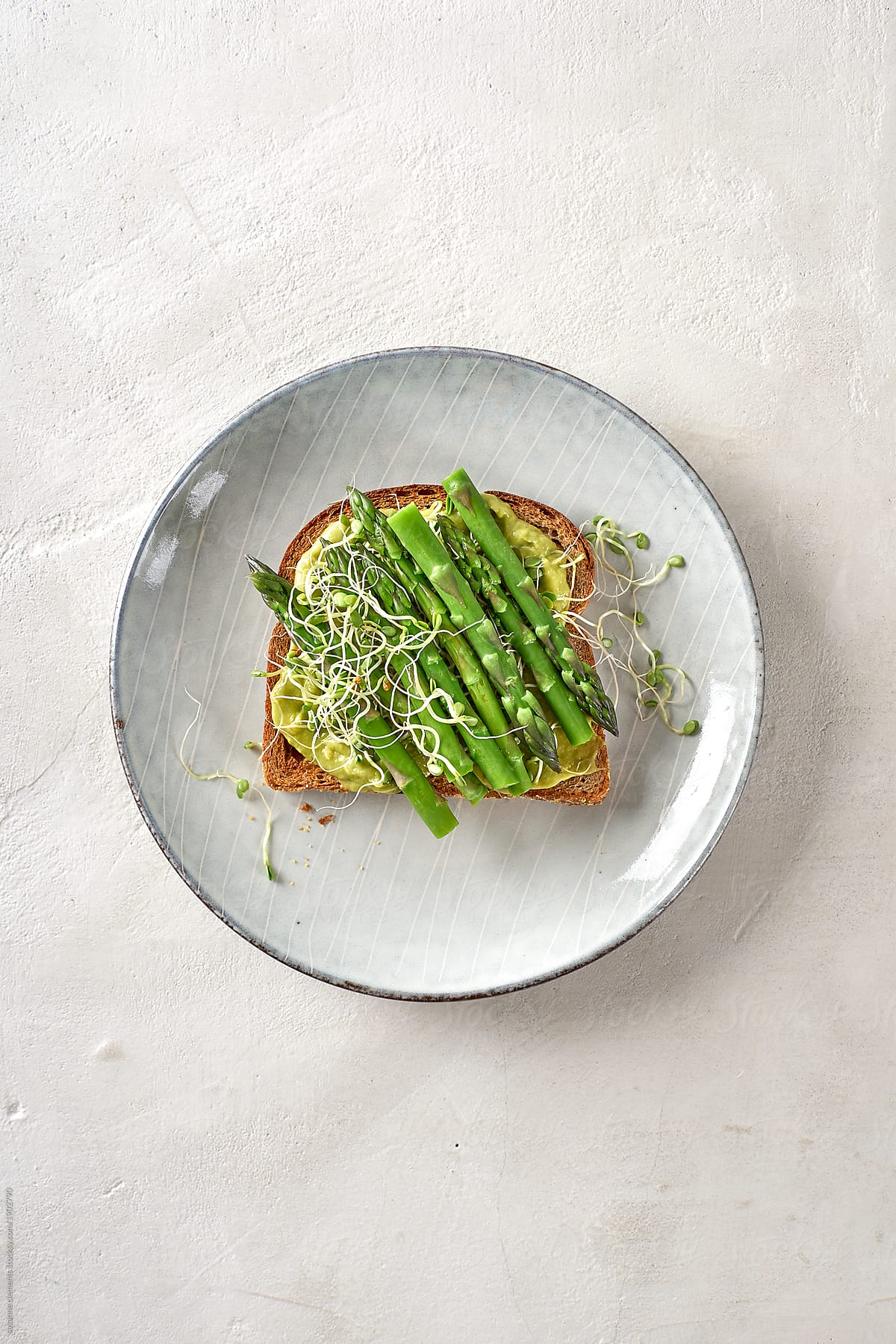 Green Avocado Asparagus and Sprouts Breakfast Toast