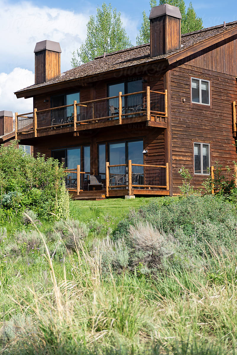 Wood Two Story Cabin and Prairie in Wyoming