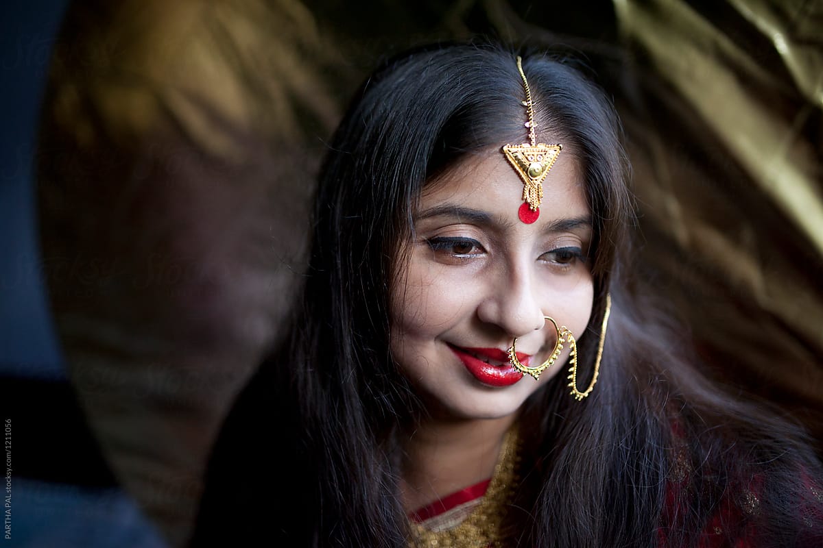 Young Indian woman with decorative Jewellery