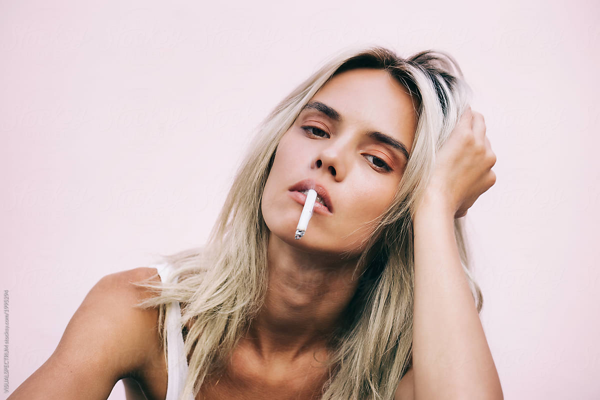 Cool Young Blonde Smoking Cigarette By Visualspectrum 