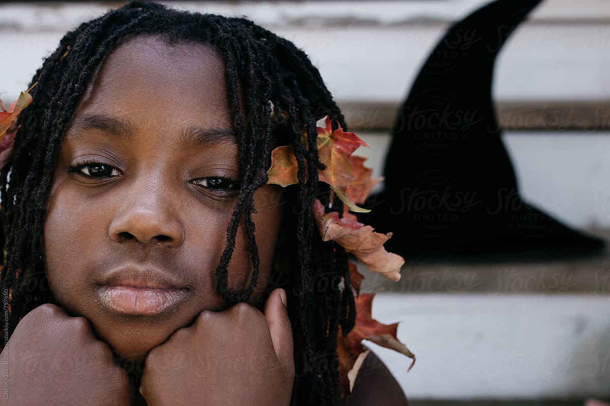 African American Girl With Fall Leaves In Her Hair By Stocksy Contributor Gabi Bucataru