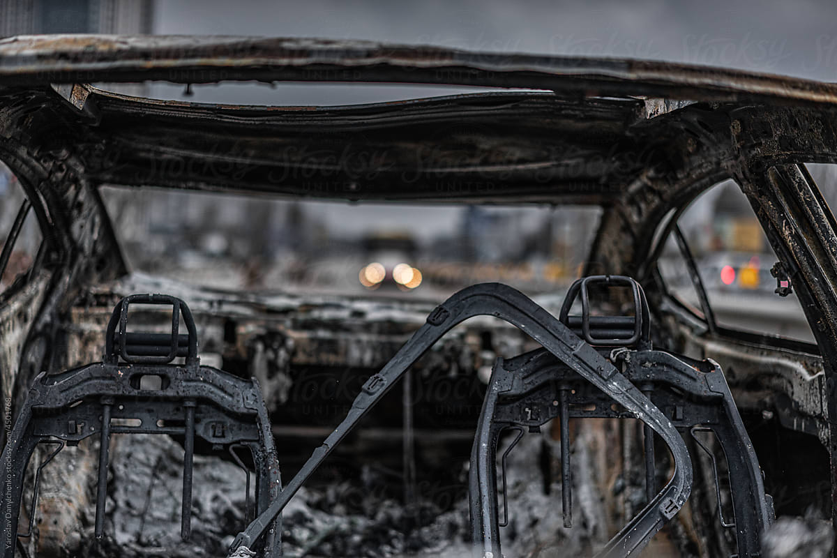 Close up of burned auto on street of ukrainian city