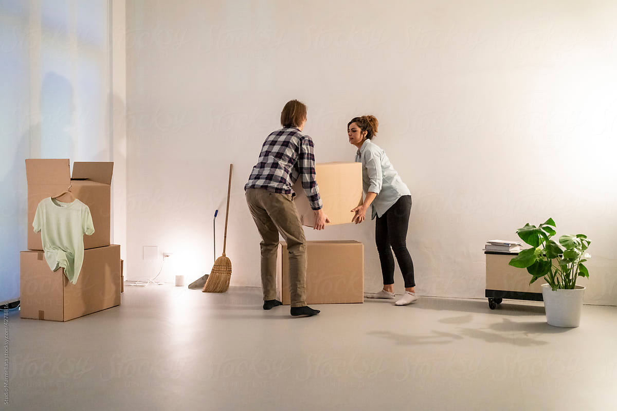 Young couple relocating to new apartment