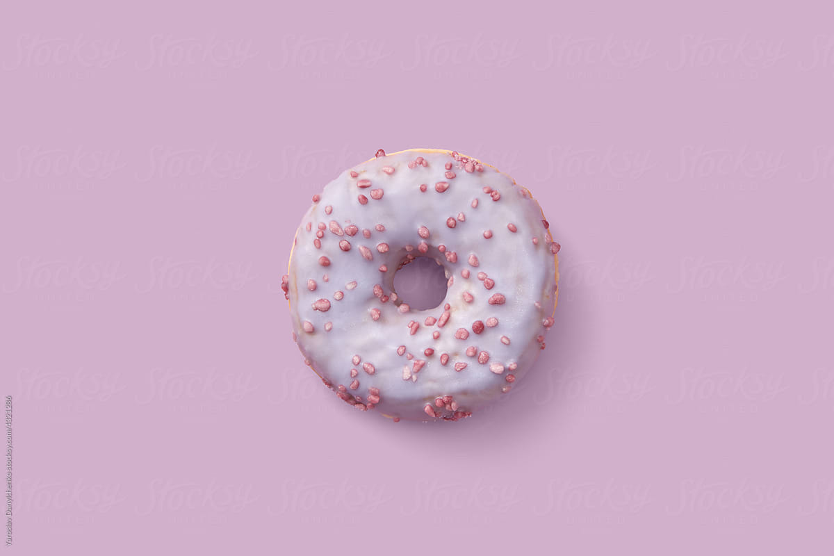 One glazed donut with sprinkles