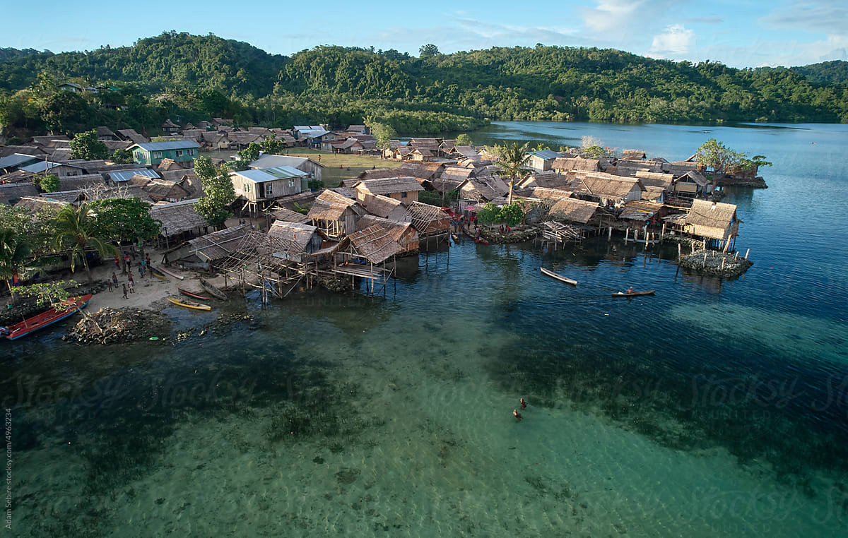 Hagalu floating village, Solomon Islands low-lying stilt huts by sea