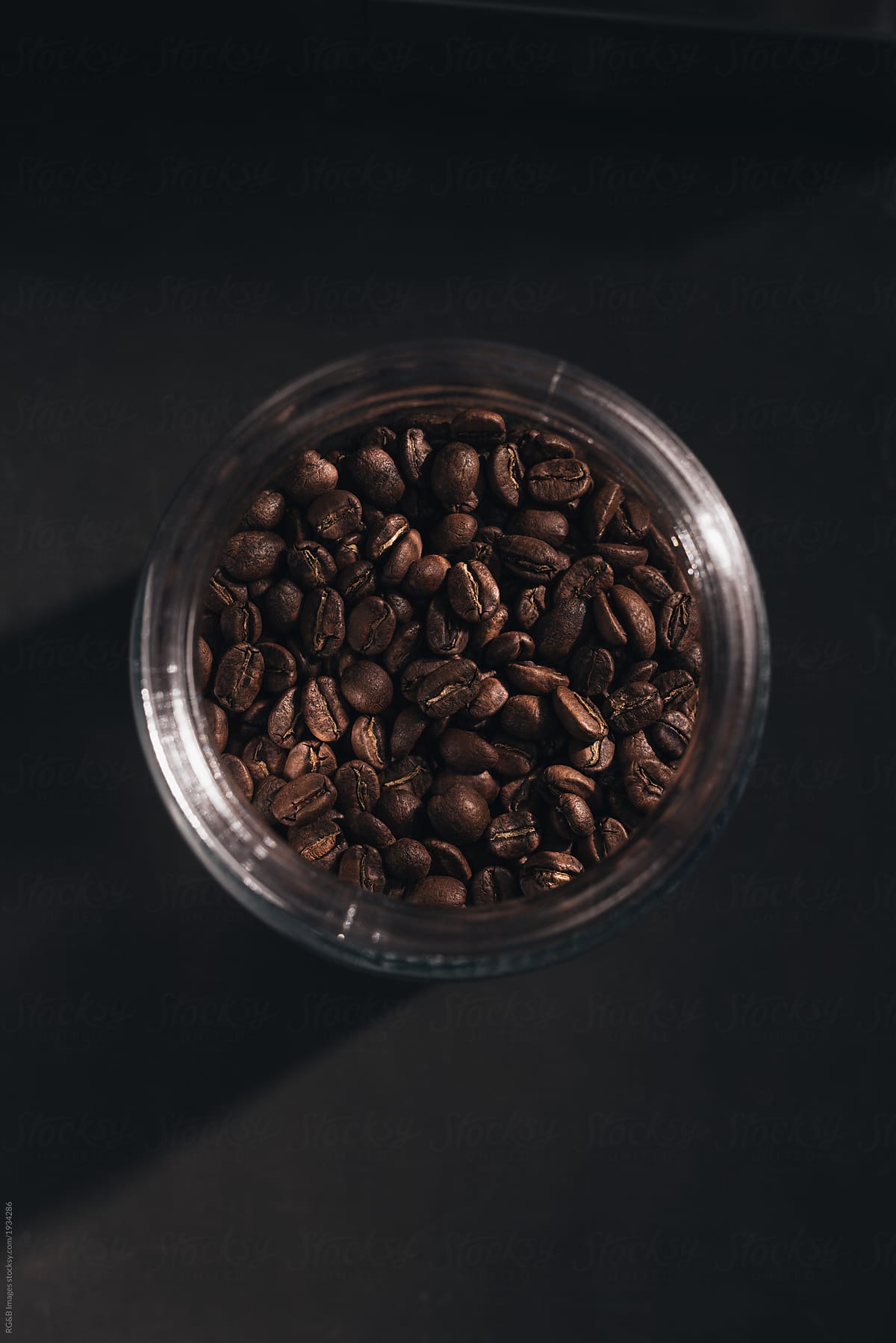 Above view of whole coffee beans in a jar