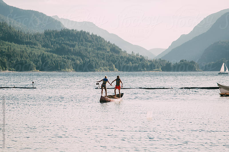 Young Adults Playing on a Canoe