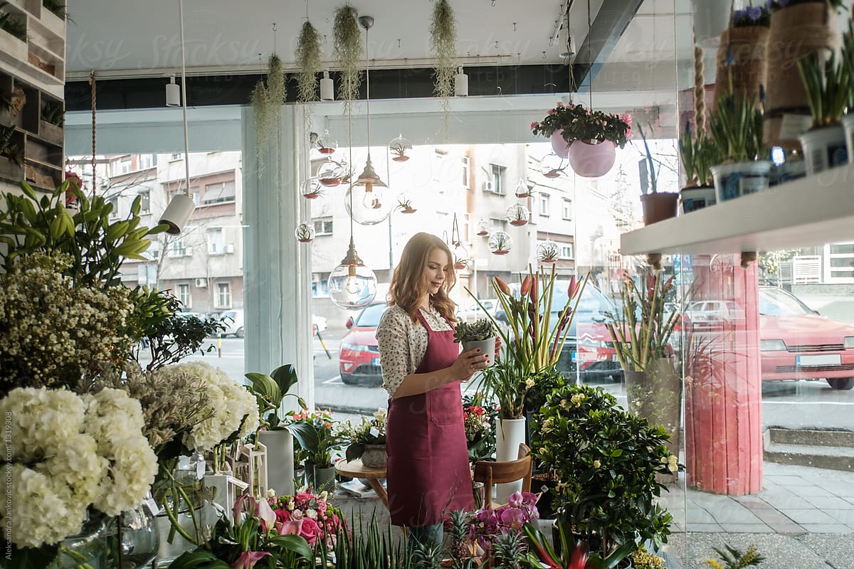Female Employee In The Flower Shop