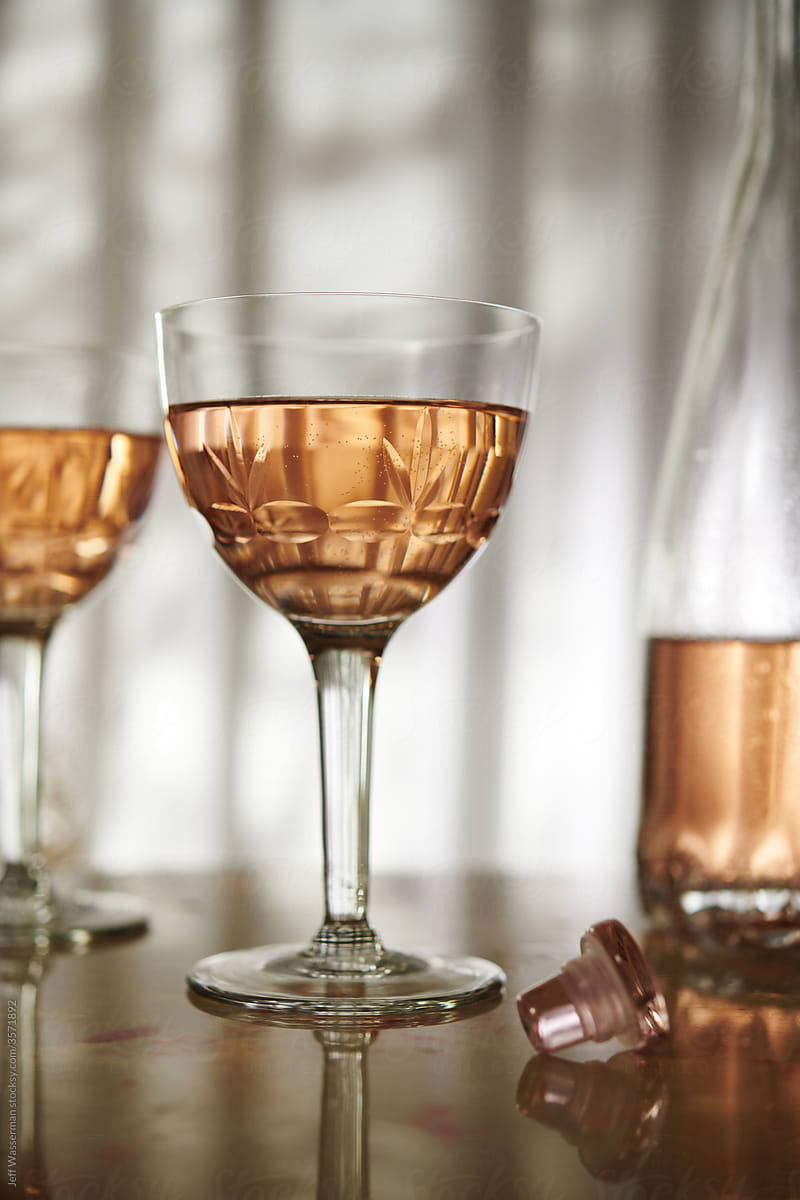 Two Glasses of Rose Wine in Vintage Glasses