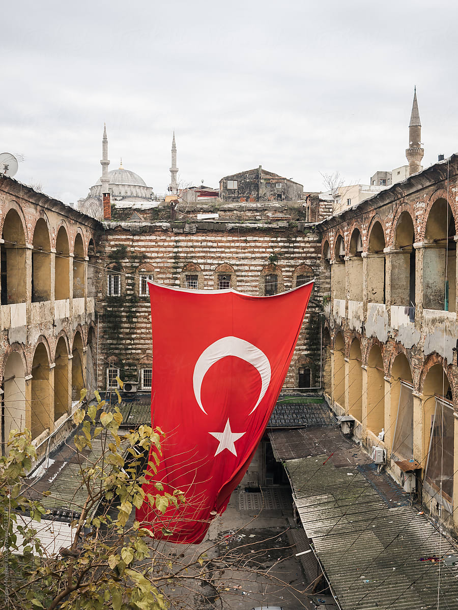 Court of old building with flag of Turkey