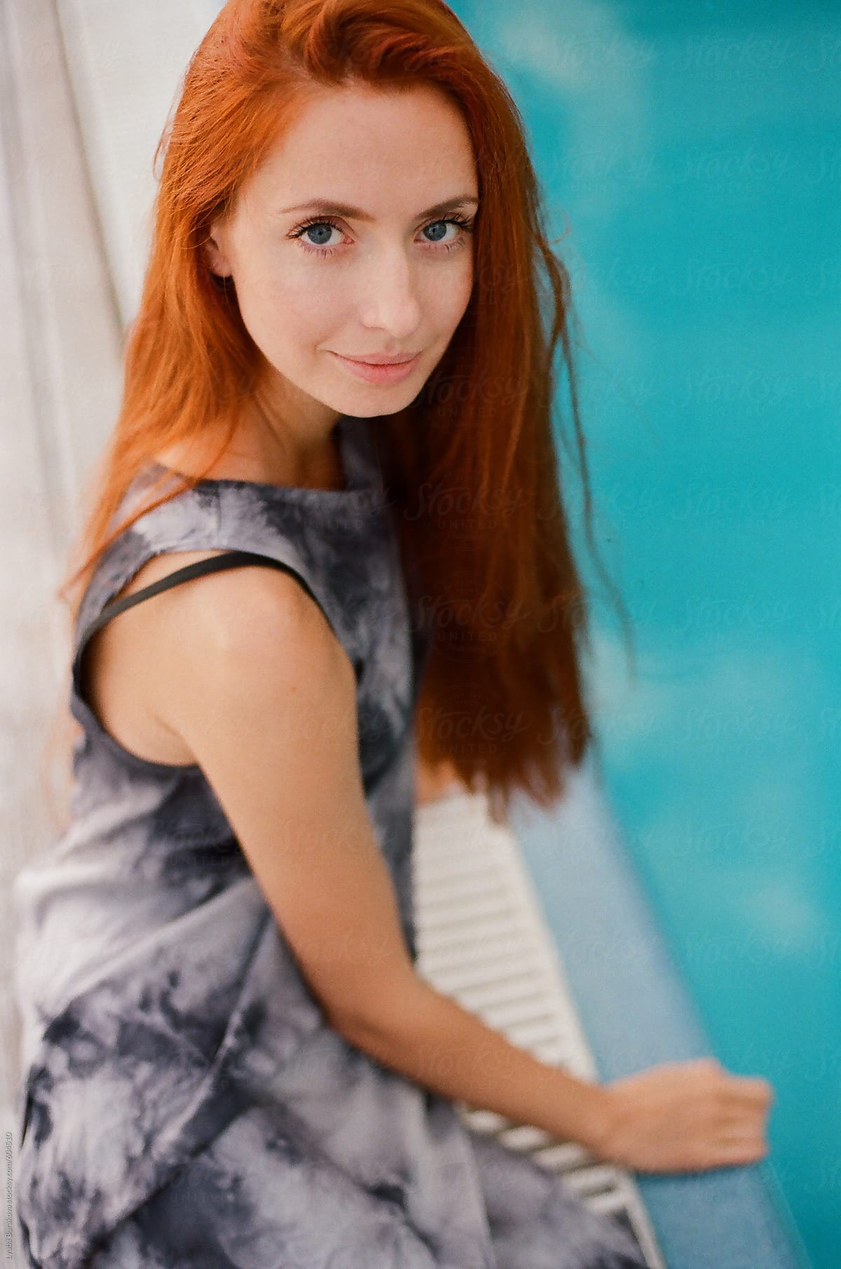 Portrait Of Beautiful Ginger Woman Looking At Camera By Lyuba Burakova